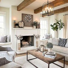 a living room filled with furniture and a fire place