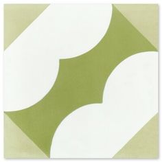 a green and white tile with circles on it