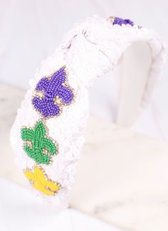 This white fabric headband is covered in sequins with three fleur de lis beaded accents. They are lined in CZs for an extra pop of sparkle! Mardi Gras Headband, Mardi Gras Queen, Headband White, Fabric Headbands, White Headband, White Fabric, White Fabrics, Mardi Gras, Customized Gifts