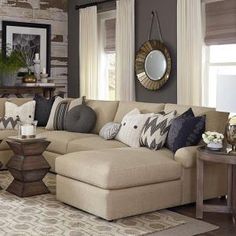 a living room filled with lots of furniture