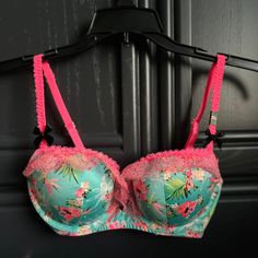 Size: 32c And New With Tags Beautiful Tropical Floral Print And Lace Very Sexy Balconet Push-Up Bra. Perfect Condition. Never Worn. Pink Coquette Underwire Bra, Victoria's Secret Pink Floral Print Bra, Spring Pink Bra With Lined Body, Pink Lined Spring Bra, Spring Pink Lined Bra, Summer Pink Bra With Lined Body, Victoria's Secret Fitted Floral Print Bra, Fitted Pink Floral Bra, Fitted Pink Floral Print Bra