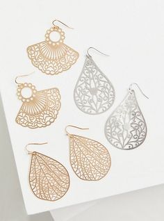 Gold-tone fan and teardrop earrings dazzle, while silver-tone teardrops pop in this gorgeous set of filigree earrings. Set of 3. French hooks. Base metal. Imported. The best plus size women's gold-tone filigree fan earrings set - of 3 sets in multi. Torrid is your destination for cozy fall and winter clothes to keep you warm and comfortable. Filigree Teardrop Chandelier Earrings, Teardrop Filigree Chandelier Earrings, Metal Teardrop Filigree Earrings, Black Cold Shoulder Top, Premium Leggings, Black Bike, Rainbow Tie, Fan Earrings, Filigree Earrings