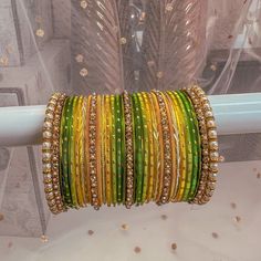 Yellow Bangles, Antique Gold Bangles, Green Bangles, Ganesha Artwork, Bangle Stack, Bridal Jewelry Sets Brides, Colorful Bangles, Silk Thread Jewelry