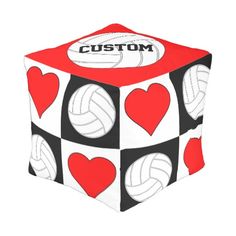 a cube with hearts and volleyball balls on it