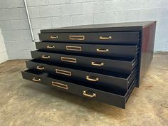 five drawers are stacked on top of each other