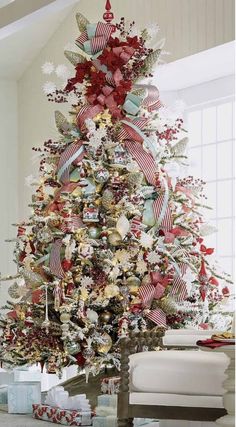 a decorated christmas tree in a living room