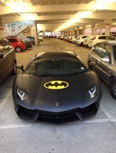 a batman car parked in a parking garage