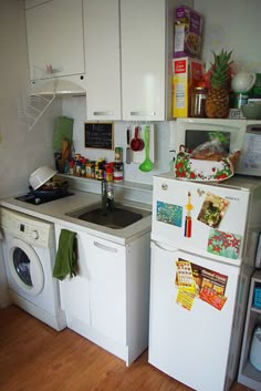 the kitchen is clean and ready to be used as a laundry room or office space