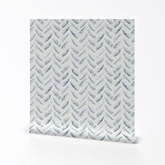 an image of a white wallpaper with blue waves on the pattern and back ground