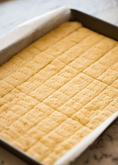 a pan filled with crackers sitting on top of a counter