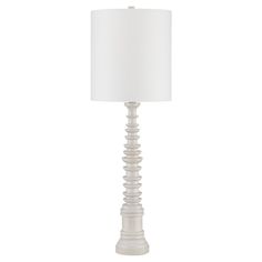 a white table lamp with a white shade on the base and a white fabric lampshade