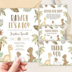 a baby shower with dinosaurs, palm trees and other things to say on it