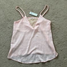 Soft Pink Camisole With Lace Inset On Chest From Francesca’s. New With Tags, Size Small. Small Red Dot On The Back Of The Shirt As Seen In 3rd Picture. Pink Sleeveless Blouse Camisole For Spring, Feminine V-neck Camisole For Spring, Pink Camisole Blouse For Spring, Feminine V-neck Camisole For Day Out, Spring Pink Camisole Blouse, Spring Feminine V-neck Camisole, Spring V-neck Feminine Camisole, Pink Camisole With Built-in Bra And Spaghetti Straps, Pink Lace Sleep Camisole