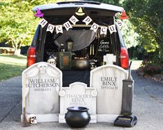 a van is decorated with tombstones and decorations