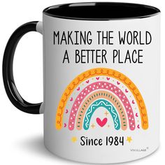 a black and white coffee mug that says making the world a better place since 1994