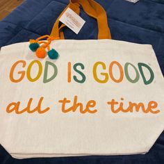 a tote bag with the words god is good all the time written on it