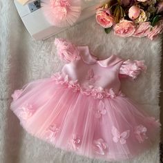 custom handmade dresses for your baby. Made with tulle. It is prepared with a soft cotton lining. It has a zipper on the back, very easy and comfortable to wear. 👉🏻 you can leave a message for more questions 👉🏻 It is a handmade dress that you can measure and customize. Very dense tulle layers are used, very fluffy, personalized color options are available, you can customize ✈️Express within 3-5 days to most countries💝 Princess Style Pink Fairy Dress With Floral Applique, Cute Pink Princess Dress With Floral Applique, Birthday Dress With Floral Applique In Tulle, Summer Baptism Tutu Dress With Floral Applique, Cute Floral Applique Dress For Birthday, Pink Fairy Dress With Floral Applique For Party, Cute Butterfly Dresses For Spring, Pink Princess Tutu Dress With Floral Applique, Pink Fairy Dress For First Birthday Spring