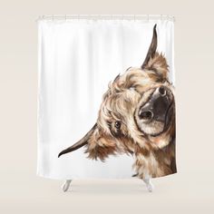 a shower curtain with a painting of a dog's head on the front and side