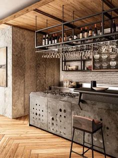 an industrial style bar with stools and shelves