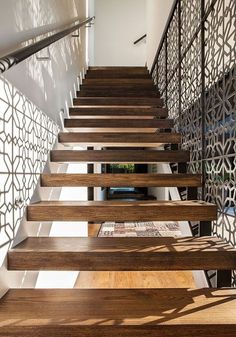 the stairs are made of wood and metal