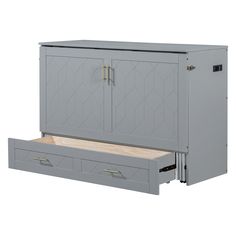 a gray cabinet with two drawers and a drawer underneath the door is open to reveal a bed