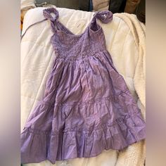 Purple Summer Dress. Size Medium. Never Worn And In Perfect Condition Cheap Sleeveless Sundress By Urban Outfitters, Urban Outfitters Ruffled Sundress For Day Out, Urban Outfitters Ruffled Sundress For Beach, Urban Outfitters Sleeveless Sundress With Ruffles, Urban Outfitters Ruffled Vacation Dress, Urban Outfitters Ruffled Dress For Vacation, Urban Outfitters Cotton Sundress For Vacation, Chic Cotton Sundress By Urban Outfitters, Urban Outfitters Vacation Dress With Ruffles