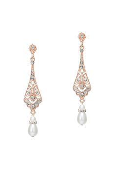 This sumptuous piece of jewelry features a retro-elegant yet slightly modern style that complements the lavish garments, reminiscent of the roaring 1920s. Features: Stunning crystals and eco-friendly alloy Crystal studded design 3.23 inch / 8cm long Dangling pearl design Roaring 20s Jewelry, 1920s Earrings, Gatsby Earrings, Great Gatsby Themed Party, 1920s Jewelry, Gatsby Themed Party, Pearl Earrings Wedding, Pearl Design, Crystal Stud Earrings