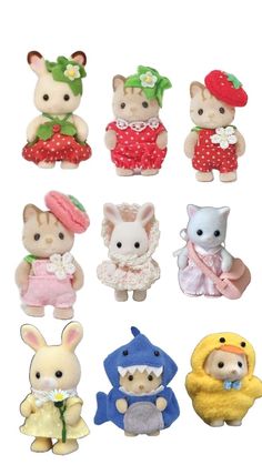 many small stuffed animals are shown together