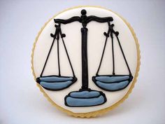 a cookie decorated with the scales of justice