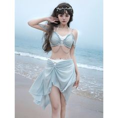 Swimwear that makes you look like a fantastic goddess with a mysterious shine. The ruffles and elegant drapes create a romantic atmosphere. Decorative chains are attached to the waist and chest. 
 
 
 
 Tops 
 Bottoms 
 
 
 Size 
 
 S size
 
 Tops
 
 Length: 29.5cm 
 Bust: 76cm 
 Waist: 65cm 
 
 
 Bottoms
 
 Total length: 70cm 
 Waist: 64cm 
 Hip: 82cm 
 
 
 
 
 M size
 
 Tops 
 
 Length: 29.5cm 
 Bust: 80cm 
 Waist: 69cm 
 
 Bottoms 
 
 Total length: 72cm 
 Waist: 68cm 
 Hip: 86cm 
 
 
 
 L siz Chinese Bathing Suit, Light Blue Swimsuit, Beach Summer Outfits, Japanese Swimsuit, Kawaii Swimsuit, Without Bra, Classic Lolita, Japanese Sweet, Chain Top