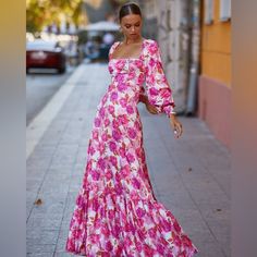 Sold Out Everywhere. Size Xs. Only Worn For A Couple Hours For Engagement Photos. Gorgeous And You Feel Like A Princess. Worn In The Fourth Photo. Melia Stands As A Sublime Representation Of Beauty In The Form Of A Vibrant Pink Floral Maxi Dress. Crafted From A Delicate Pink Floral Fabric, It Boasts A Refined Straight Neckline, Elegantly Billowing Long Sleeves, And A Sweeping A-Line Skirt. This Ensemble Radiates An Undeniable Aura Of Timeless Elegance. Pink Floral Fabric, Alamour The Label, Pink Floral Maxi Dress, Straight Neckline, A Princess, Photo Colour, Floral Maxi, Floral Fabric, Floral Maxi Dress