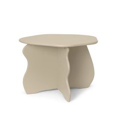 a small white table with an unusual shaped design on the top and bottom, sitting in front of a white background