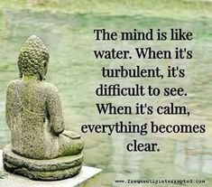 a buddha statue sitting on top of a cement block next to water with the words, the mind is like water when it's turbulent, it's difficult to see