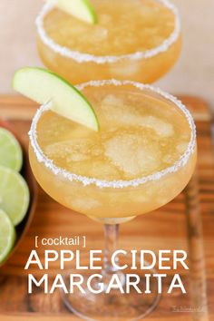 two glasses filled with an apple cider margarita