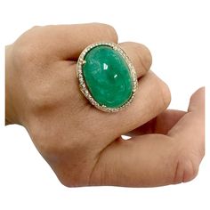 Luxury Oval Cabochon Emerald Ring With 17 Jewels, Luxury Emerald Ring With Oval Cabochon And 17 Jewels, Fine Jewelry Emerald Oval Cabochon Ring, Fine Jewelry Emerald Ring With Oval Cabochon, Luxury Oval Cabochon Emerald Ring, Fine Jewelry Emerald Diamond Cabochon Ring, Luxury Oval Cabochon Diamond Gemstones, Yellow Gold Emerald Ring Oval Cabochon, Yellow Gold Emerald Ring With Oval Cabochon