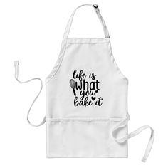 a white apron with pink and black writing on it that says, give every woman