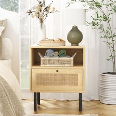 a wooden shelf with baskets and towels on it