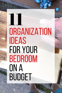 a person holding a piece of wood with the words 11 organization ideas for your bedroom on a budget