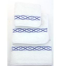 three white towels stacked on top of each other with blue trim around the edges and bottom