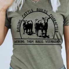 Western Horizons Trading Company | Tops | Raising Cattle Builds Character Tshirt Unisex | Poshmark Western Sayings For Shirts, Farm Merch, Ariat Clothing, Country Girl Style Outfits, Farmer Outfit, Raising Cattle, Trendy Shirt Designs, Country Girl Style, Cute Shirt Designs