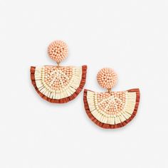 Dive into the vibrant colors of summer with our Josephine Grapefruit Raffia Drop Earrings in Blush Pink. The playful grapefruit slice design, crafted from raffia and glass beads, adds a burst of bold energy to your ensemble. So grab your favorite sun dress, a cute pair of sandals, and get vacation-ready with your favorite new citrus earrings. --DETAILS-- 1.79" L, 1.57" W Handmade by skilled artisans in India Hypoallergenic nickel + lead-free brass hardware These accessories are made by human hands. A slight variation in size and color is considered part of the beauty of these one-of-a-kind pieces. To extend the life of your accessories, store them in a dry place while swimming, showering, or working out. Original design copyright INK+ALLOY© --END OF DETAILS-- Spring Beach Pink Beaded Earrings, Spring Pink Beaded Earrings For Beach, Pink Beaded Earrings For Spring Beach, Orange Earrings For Spring Beach Outing, Pink Bohemian Beaded Earrings For Vacation, Orange Summer Earrings For Vacation, Pink Beaded Earrings For Beach, Peach Earrings For Summer Gift, Pink Beaded Earrings For The Beach