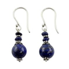 Narayani highlights the unique beauty of lapis lazuli the September??s birthstone in the design of these earrings. Lapis is said to open all the chakra centers as long as there is love in the heart comprehension in the mind and wisdom in the soul. The earrings are crafted by hand with sterling silver. .925 Sterling silver Elegant Lapis Lazuli Jewelry For Healing, Elegant Lapis Lazuli Earrings With Natural Stones, Blue Spiritual Dangle Earrings, Adjustable Healing Drop Earrings, Blue Spiritual Earrings For Gifts, Spiritual Blue Dangle Earrings, Adjustable Drop Earrings For Healing, Blue Spiritual Nickel-free Earrings, Handmade Blue Spiritual Earrings