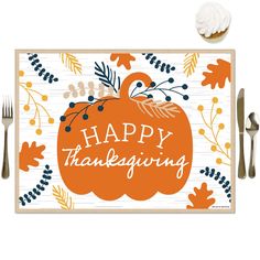 a happy thanksgiving card with an orange pumpkin surrounded by fall leaves and foliage, next to silverware