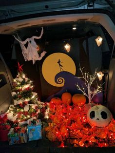 halloween decorations in the back of a car