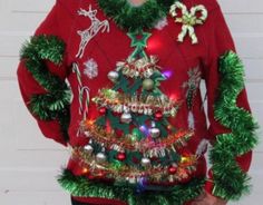 a woman wearing a ugly ugly christmas sweater