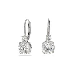 Simplicity stuns in these classic round brilliant CZ lever back earrings. Sparkling from miles away, these elegant earrings are sure to impress and delight. Details:• Round Brilliant Cubic Zirconia Stones• Rhodium Plated or 18k Yellow Gold Plated Sterling Silver• Lever-back Closure • Length: 22mm• Width: 8mm Classic Cluster Earrings For Formal Occasions, Classic Cluster Earrings With Round Cut Cubic Zirconia, Fine Jewelry Diamond Crystal Round Earrings, Timeless Round Cluster Earrings With Prong Setting, Fine Jewelry White Gold Crystal Earrings With Prong Setting, Diamond Crystal Earrings With Prong Setting, Elegant Round Cluster Earrings With Diamond Accents, White Gold Crystal Earrings With Prong Setting, Classic White Gold Cluster Earrings With Cubic Zirconia