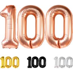 the number 100 balloon is shown in gold, silver and black