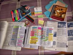 an open bible and other items on a table