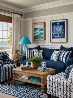 a living room with blue and white furniture