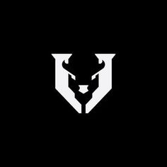 a black and white logo with an animal's head